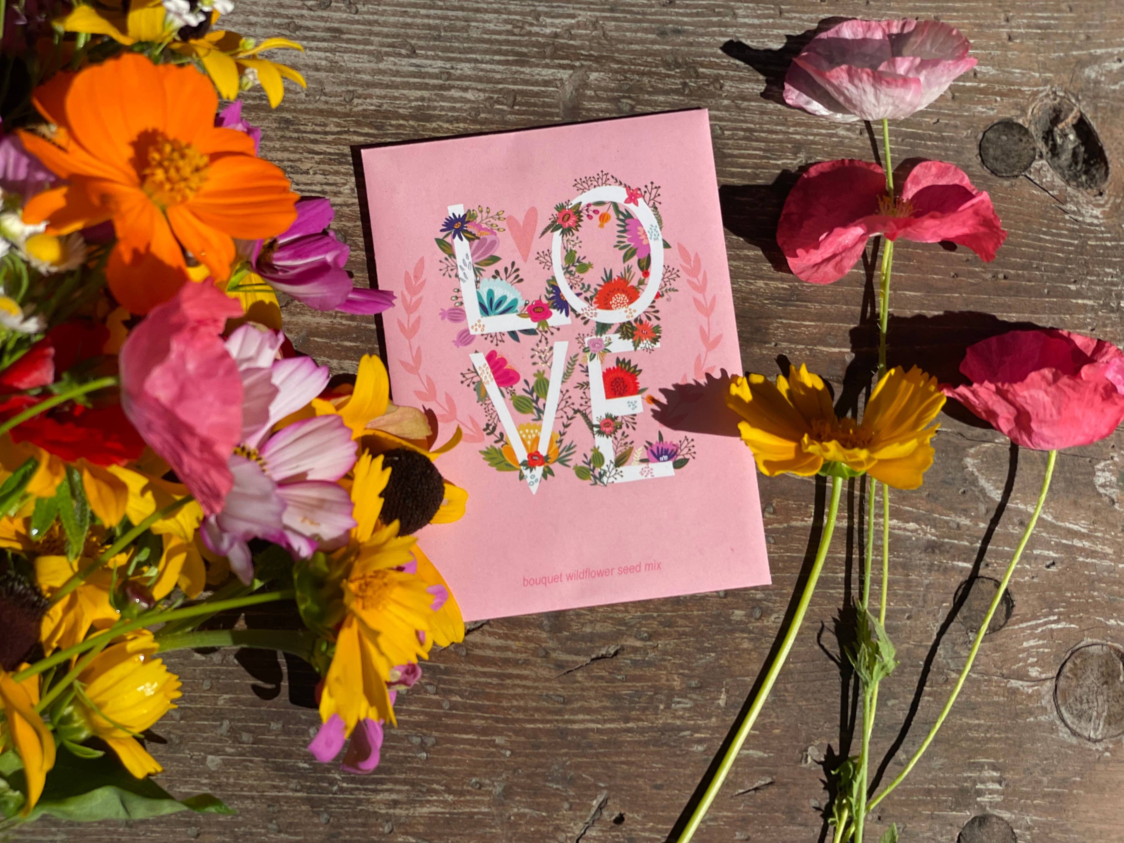 All You Need Is Love bouquet wildflower seed packets. Romantic cut-flower mix with colorful blooms — perfect for weddings, favors, and summer gardens.