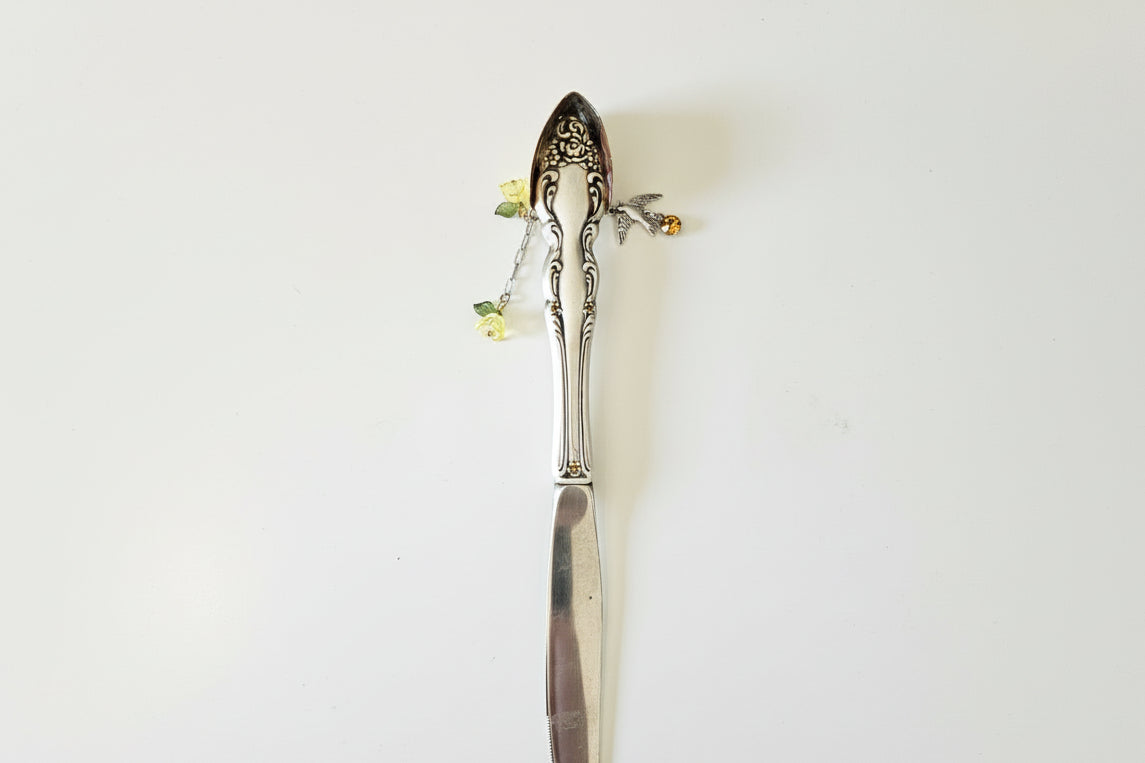Handcrafted silverware birdhouse plant stake by KStonely. Upcycled, hand-painted, and beaded—whimsical cottagecore décor perfect for adding charm to any plant.
