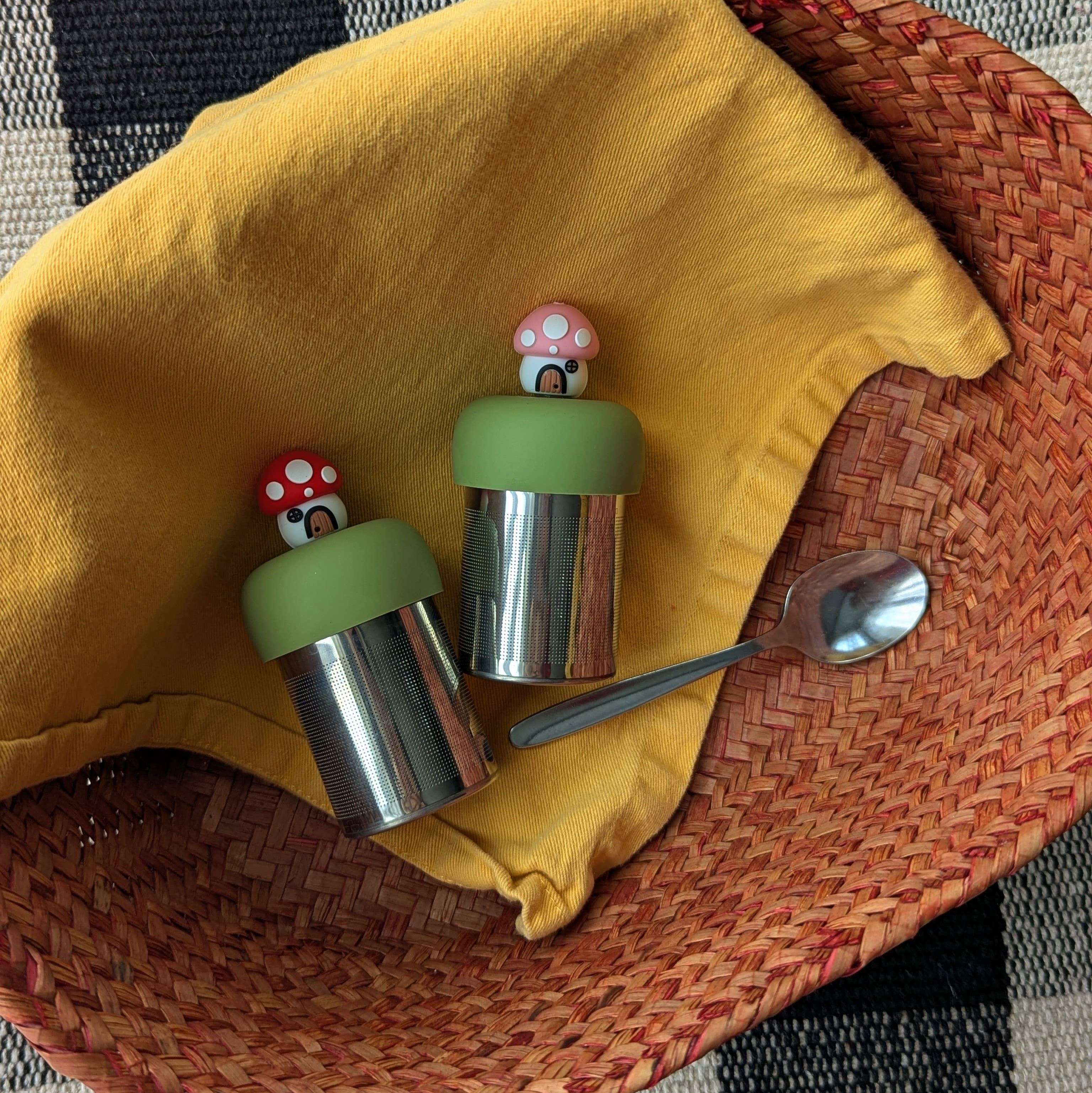 Charming Pink Mushroom Cottage Tea Steeper with silicone cap and fine mesh. Perfect for hot or iced tea, reusable, giftable, and designed with heart.