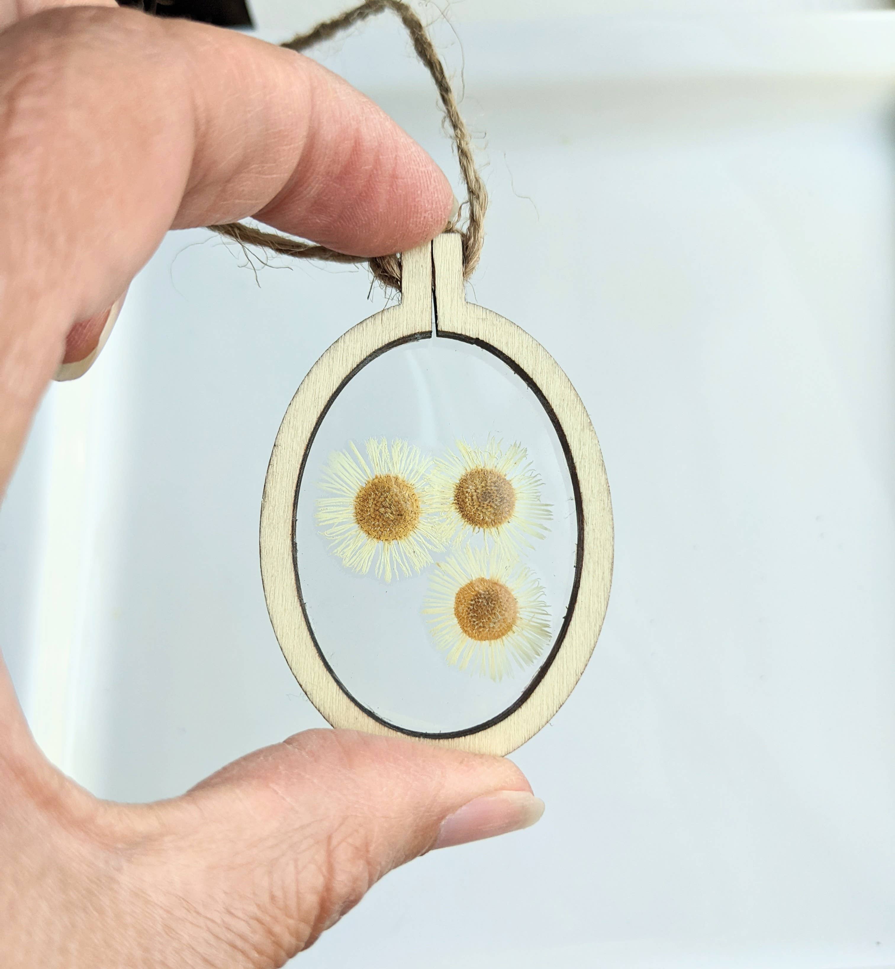 Handcrafted wood frame ornaments with real pressed flowers or leaves. Unique, nature-inspired décor perfect for holiday trees, gifts, or year-round charm.