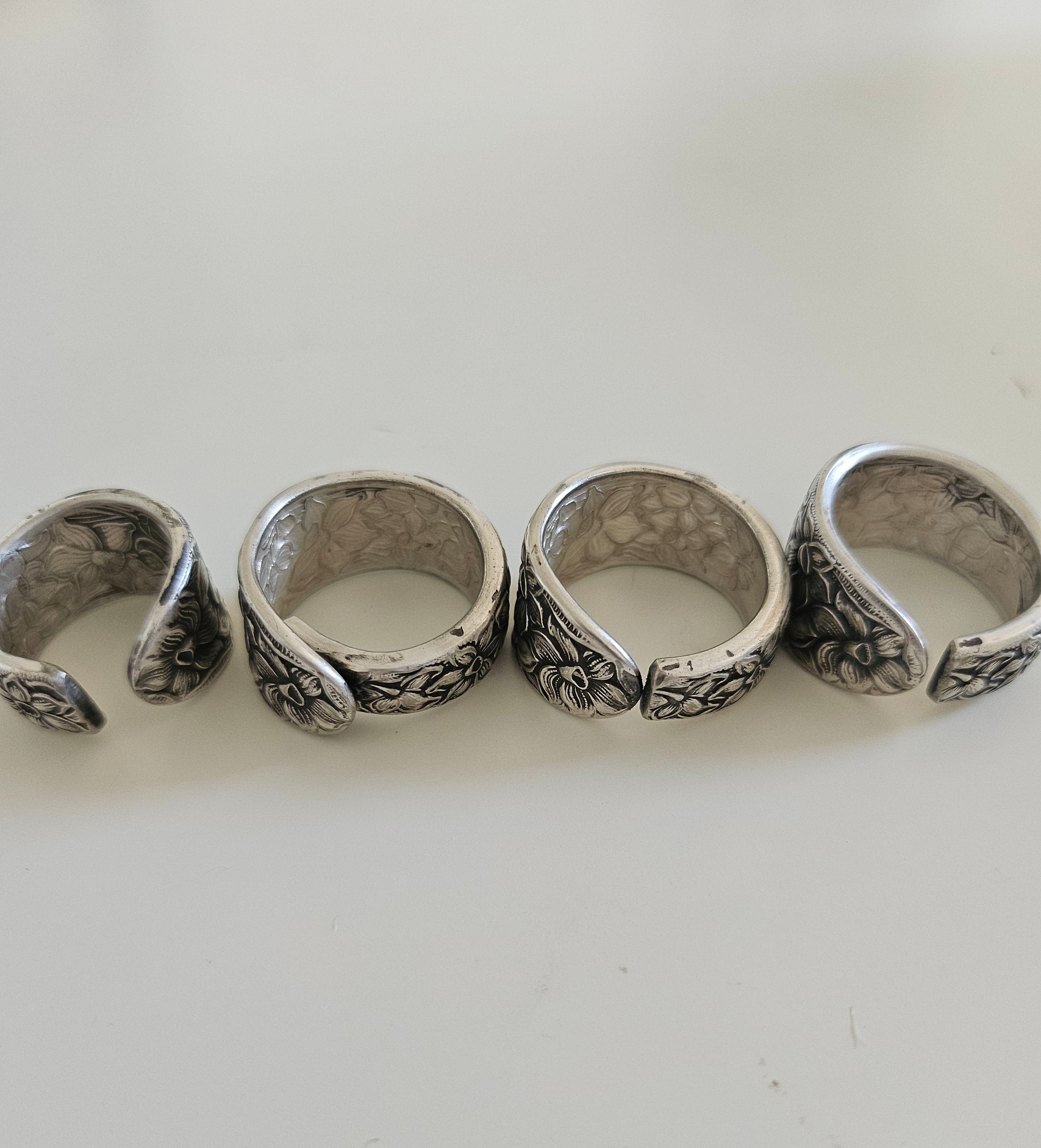 Handcrafted from 1935 Narcissus silverware, this floral ring by National Silver Co. brings vintage elegance and timeless charm to any outfit.