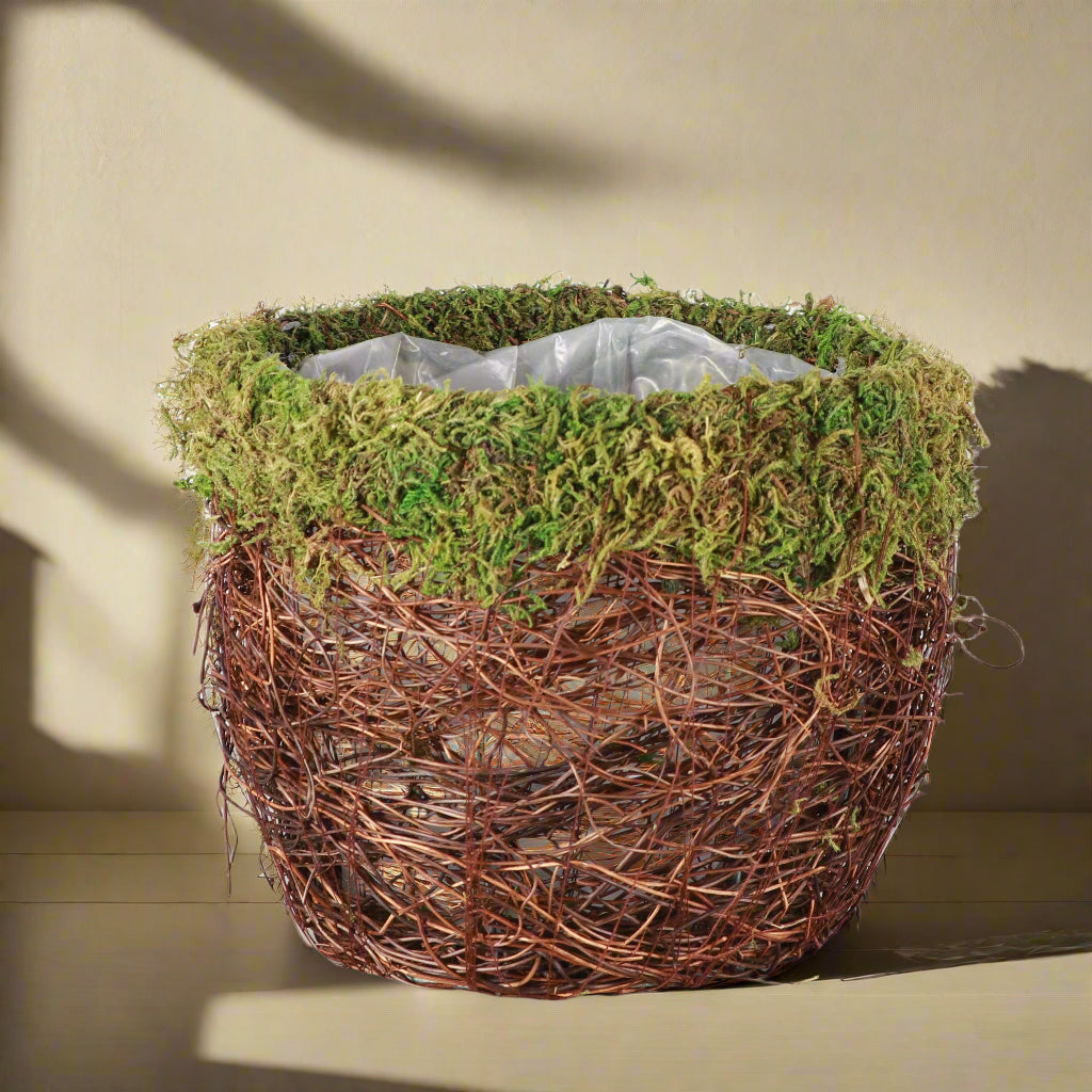 Add woodland charm with this 7&quot; mossy pot, lined with plastic for easy care. Fits 6&quot; plants perfectly—rustic, whimsical, and nature-inspired décor.
