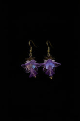 Hand-beaded Poison Garden earrings inspired by foxglove, wolfsbane, belladonna, datura, henbane and lily of the valley. Beautifully deadly botanical jewelry.