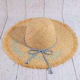 Woven raffia sun hat featuring lightweight breathable texture and timeless summer style. Perfect for beach days, vacations, casual outfits, and warm-weather fashion.