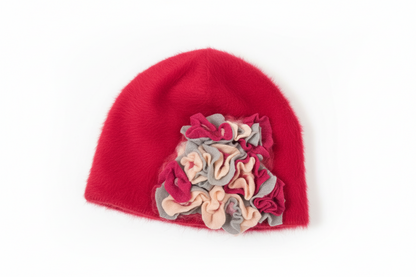 Hot pink hand-felted angora hat with sculptural ruffle detail. Cozy, lightweight, and one of a kind. Made with angora blend. Hand wash only.