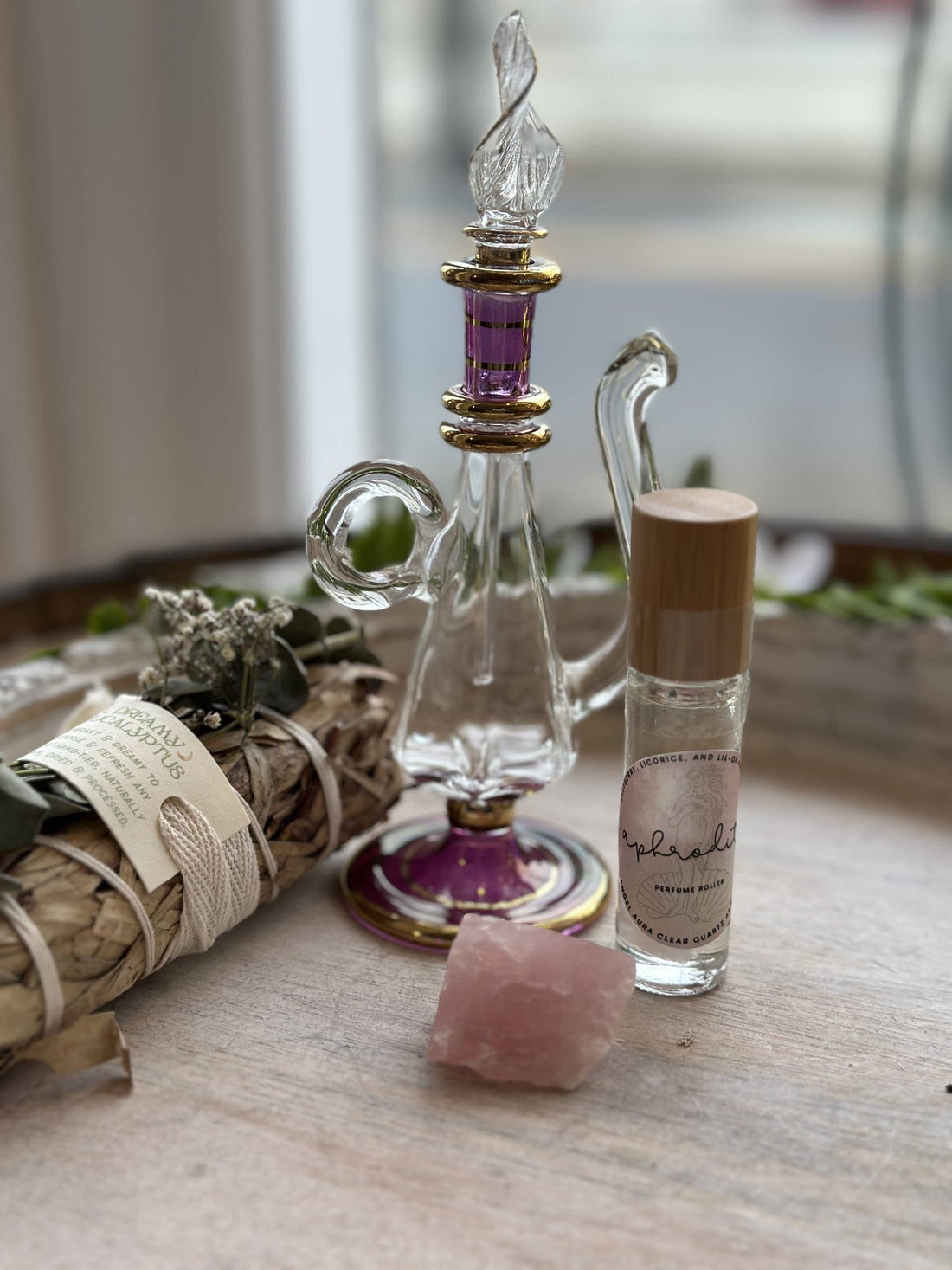 Aphrodite Goddess Perfume Roller with moonstone, rose petals &amp; coconut oil. A sweet sugar scent that inspires love, beauty &amp; divine feminine energy.