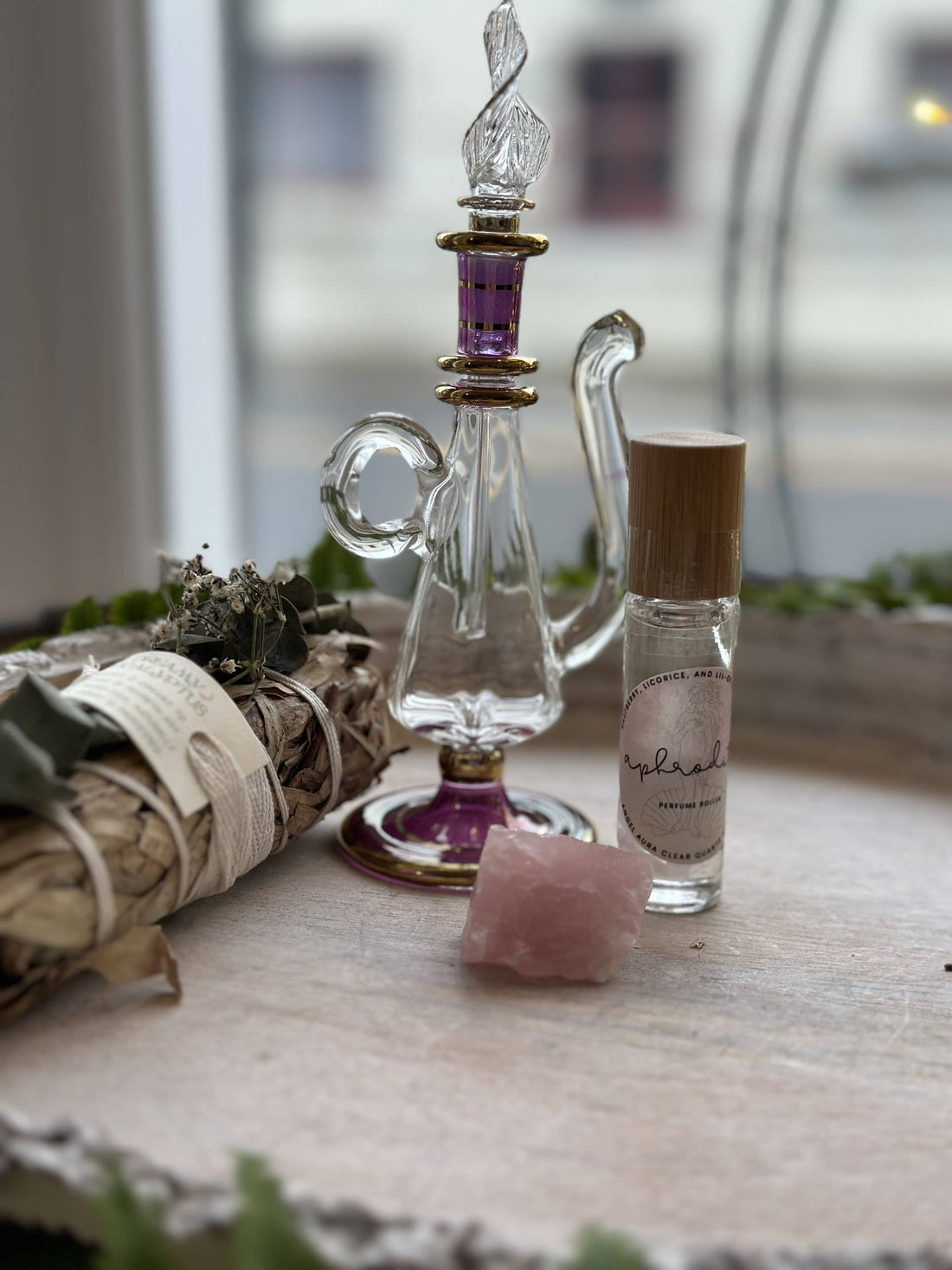 Aphrodite Goddess Perfume Roller with moonstone, rose petals &amp; coconut oil. A sweet sugar scent that inspires love, beauty &amp; divine feminine energy.
