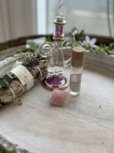 Aphrodite Goddess Perfume Roller with moonstone, rose petals & coconut oil. A sweet sugar scent that inspires love, beauty & divine feminine energy.