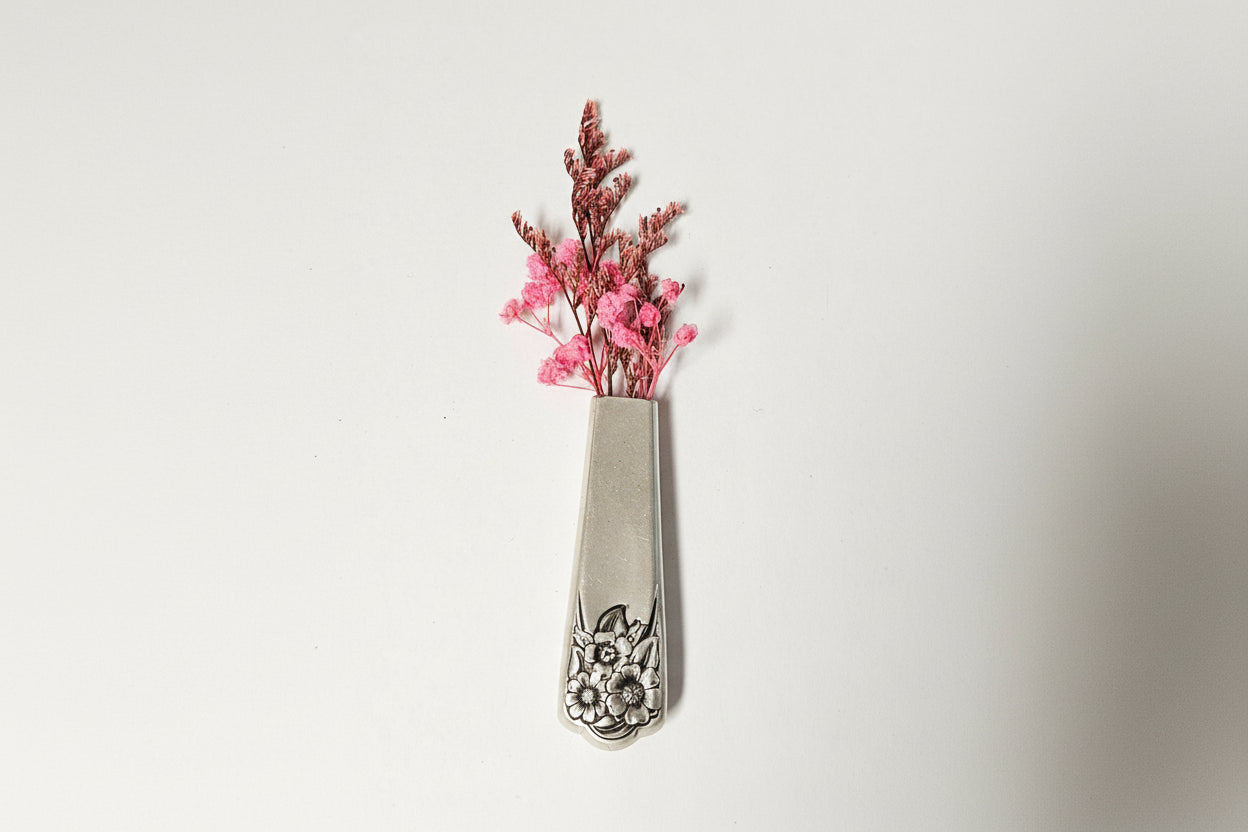 Antique silverware magnetic bud vase that sticks to fridges and metal surfaces. Holds water, one-of-a-kind vintage gift decor.
