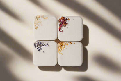 2oz handmade botanical bath bomb. Biodegradable wrap, rich oils, fizzy soak. Skin-softening, aromatic, and perfect for gifting or daily self-care rituals.