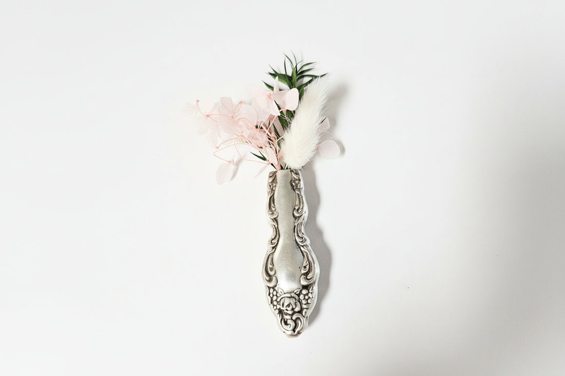 Antique silverware magnetic bud vase that sticks to fridges and metal surfaces. Holds water, one-of-a-kind vintage gift decor.