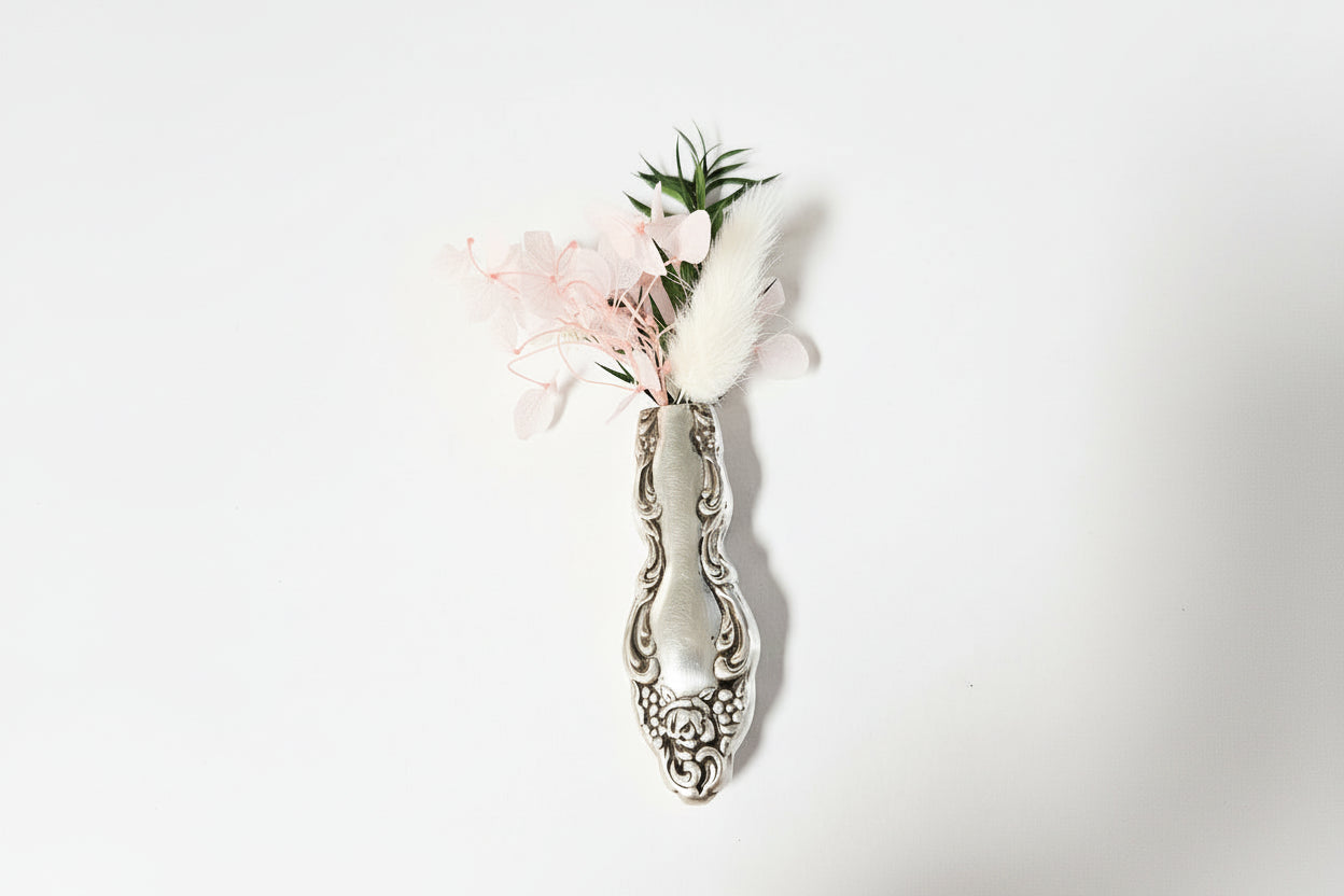 Antique silverware magnetic bud vase that sticks to fridges and metal surfaces. Holds water, one-of-a-kind vintage gift decor.