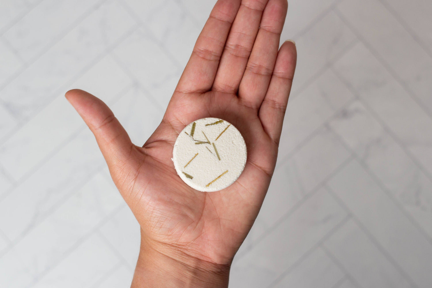 Aromatherapy shower steamer with essential oils. Biodegradable, handmade, and ultra-scented for a spa-like experience. Not for use as a bath bomb.