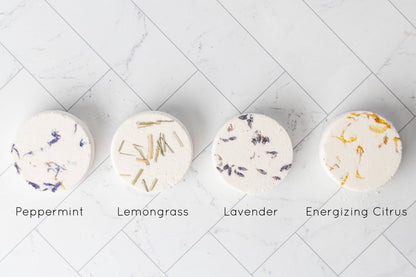 Aromatherapy shower steamer with essential oils. Biodegradable, handmade, and ultra-scented for a spa-like experience. Not for use as a bath bomb.