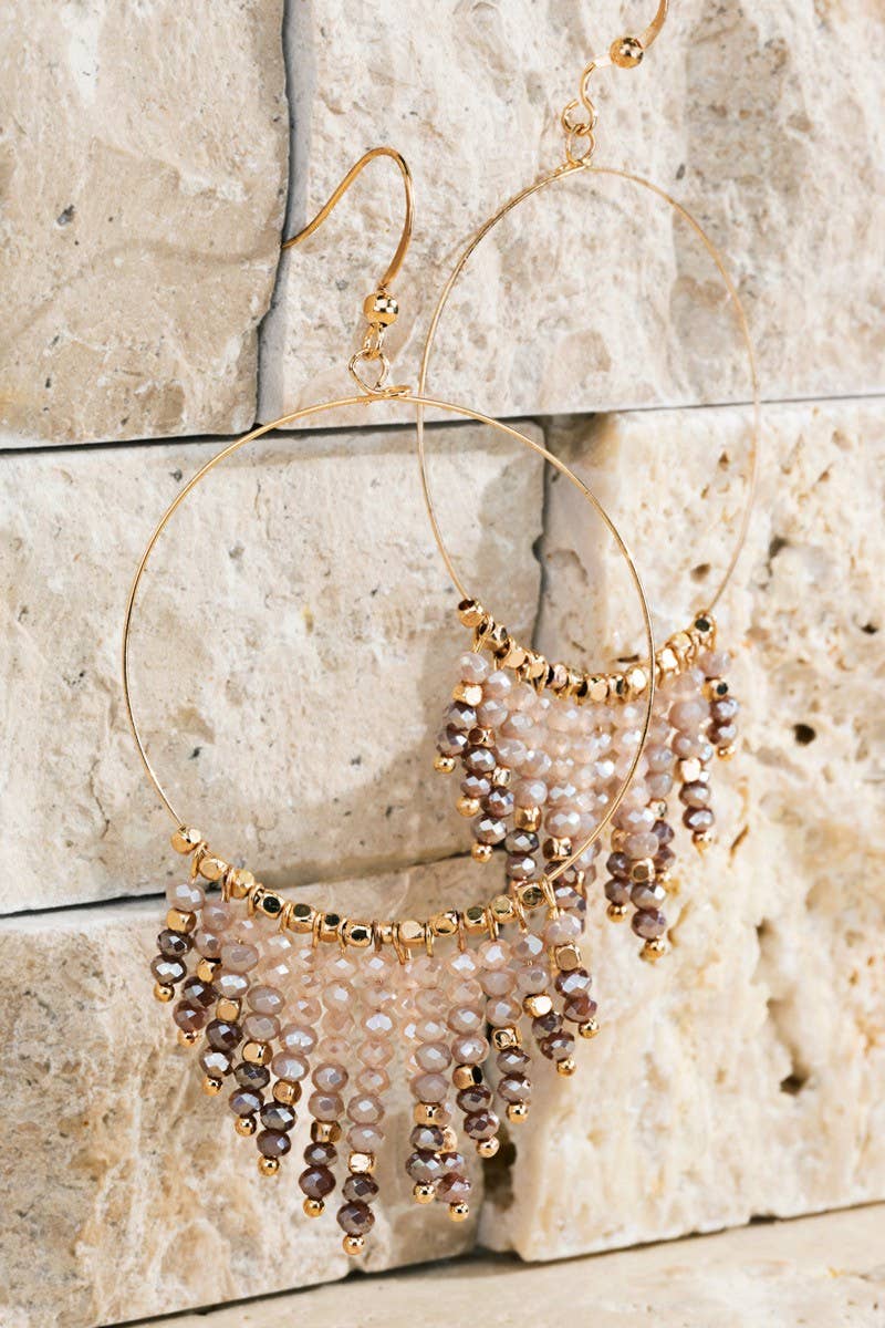 Shimmering beaded tassel chandelier earrings with a lightweight metal ring, hypoallergenic fish hooks, and dazzling glass beads—perfect for any occasion! 