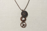 Steampunk pendants with gears, chains, tags, beads, and airship-inspired designs. Handcrafted, unique mixed-media necklaces perfect for cosplay, gifting, and fans of steampunk
