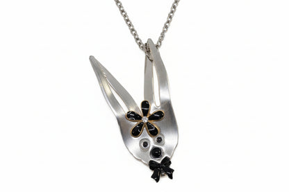 Whimsical fancy bunny pendant necklace handcrafted from vintage silverware, resin, and beads. One-of-a-kind Easter or everyday jewelry with vintage charm.