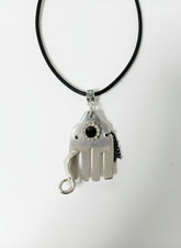 Handcrafted silver elephant pendant made from vintage silverware. Symbolizes strength, wisdom & luck. Eco-friendly, one-of-a-kind, and artisan-made in the USA.
