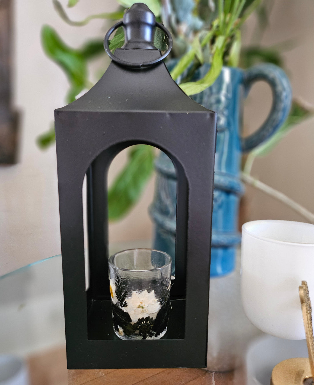 Botanical black fairy lantern with real pressed flowers and floral-scented tea lights. Perfect for witchy rituals, altars, and moody, magical spaces.