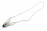 Whimsical fancy bunny pendant necklace handcrafted from vintage silverware, resin, and beads. One-of-a-kind Easter or everyday jewelry with vintage charm.