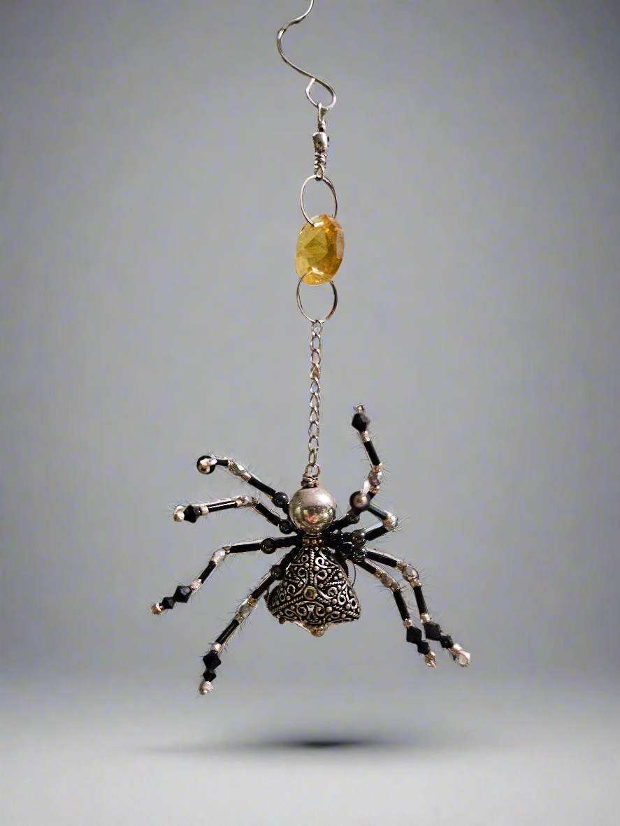 The Christmas Spider Ornament brings charm and tradition to your holiday decor. Inspired by the German legend of spiders weaving webs that Santa turned into shimmering tinsel, it symbolizes good luck and magic. Beautifully crafted, it’s a meaningful and unique addition to your tree or a thoughtful gift.