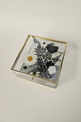 Floral mirrored keepsake and jewelry box with real pressed flowers. A 5" botanical glass box by artist Angel Singh, blending elegant storage with preserved floral art.