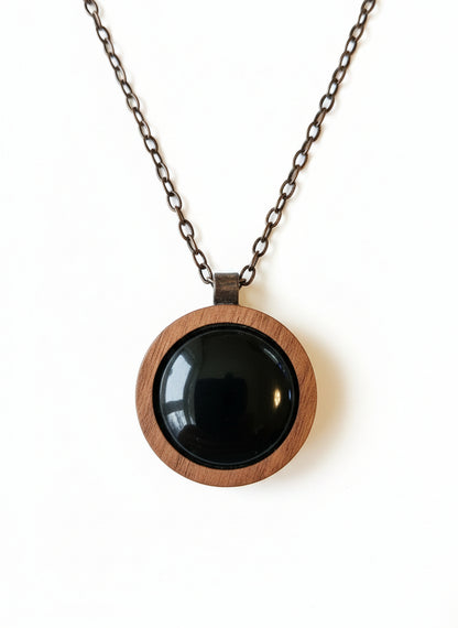 Wildcrafted Wood Art Pendants handcrafted by artist KStonely with natural wood, beads, gears, and mixed-media elements. Unique, one-of-a-kind wearable art necklaces.