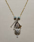 Handcrafted silver birdhouse pendant made from vintage silverware. A whimsical, one-of-a-kind necklace perfect for nature lovers and vintage jewelry fans.