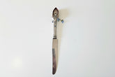 Handcrafted silverware birdhouse plant stake by KStonely. Upcycled, hand-painted, and beaded—whimsical cottagecore décor perfect for adding charm to any plant.