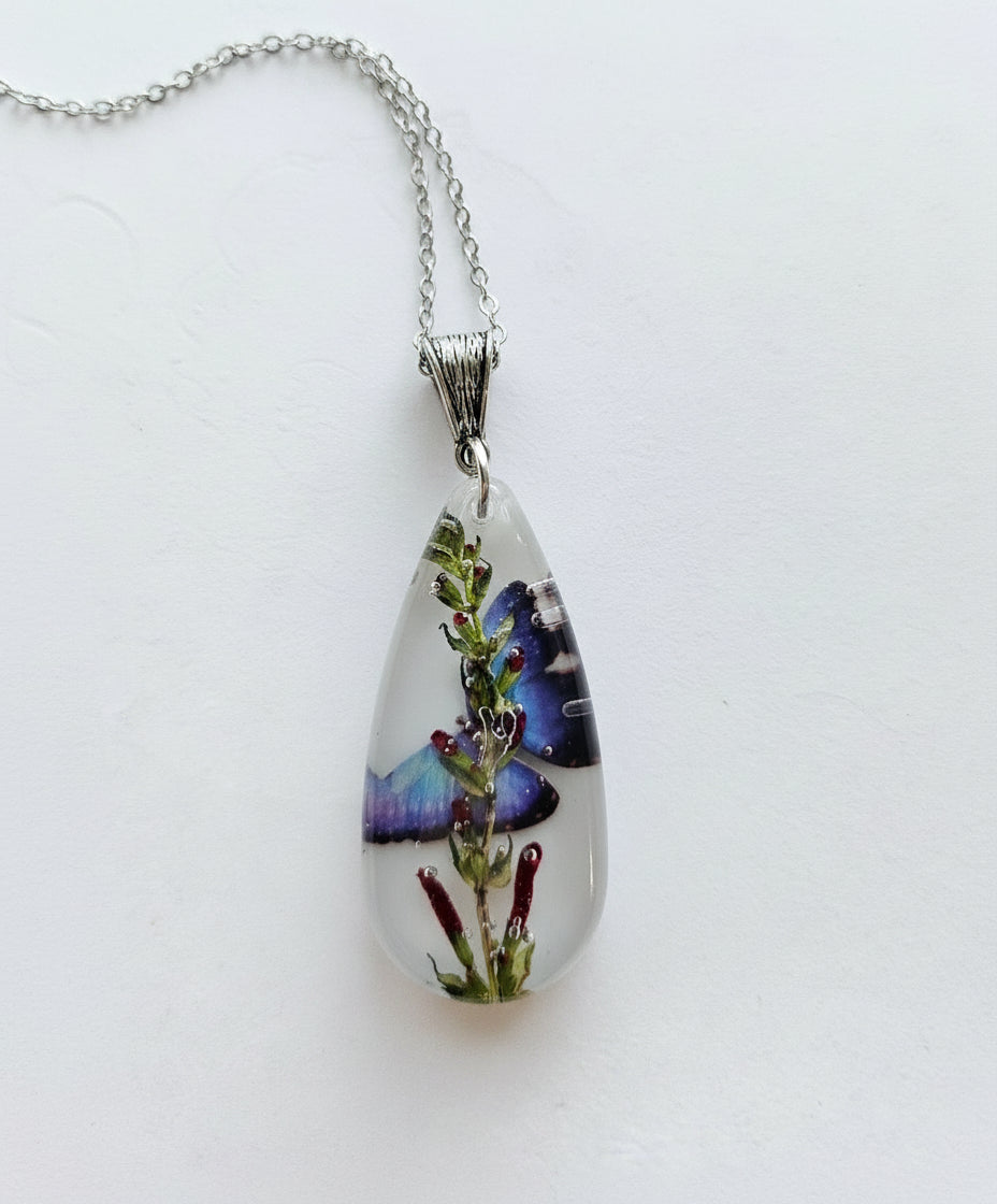 Gathered-in-the-Wild Botanical Necklace with real foraged flowers, mushrooms, pine needles, and leaves preserved in resin. Handcrafted wearable nature art by KStonely.