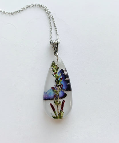 Gathered-in-the-Wild Botanical Necklace with real foraged flowers, mushrooms, pine needles, and leaves preserved in resin. Handcrafted wearable nature art by KStonely.