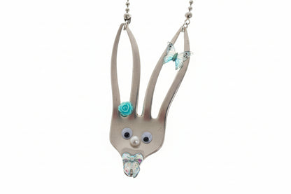 Whimsical fancy bunny pendant necklace handcrafted from vintage silverware, resin, and beads. One-of-a-kind Easter or everyday jewelry with vintage charm.