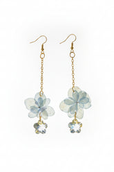 Real dried flower drop earrings preserved in resin with sparkling crystal accents. Romantic botanical jewelry with a delicate, one-of-a-kind garden feel.