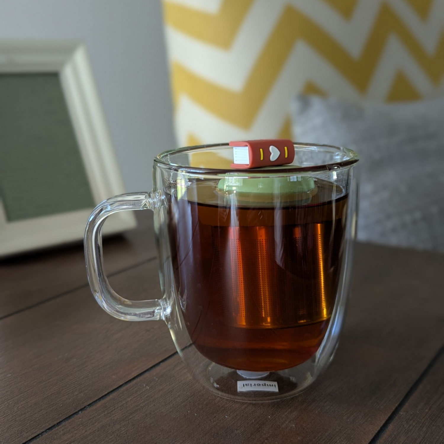 Brown Heart Book Tea Steeper makes loose leaf tea easy in any mug. Reusable, dishwasher safe, eco-friendly. A charming gift for tea and book lovers.