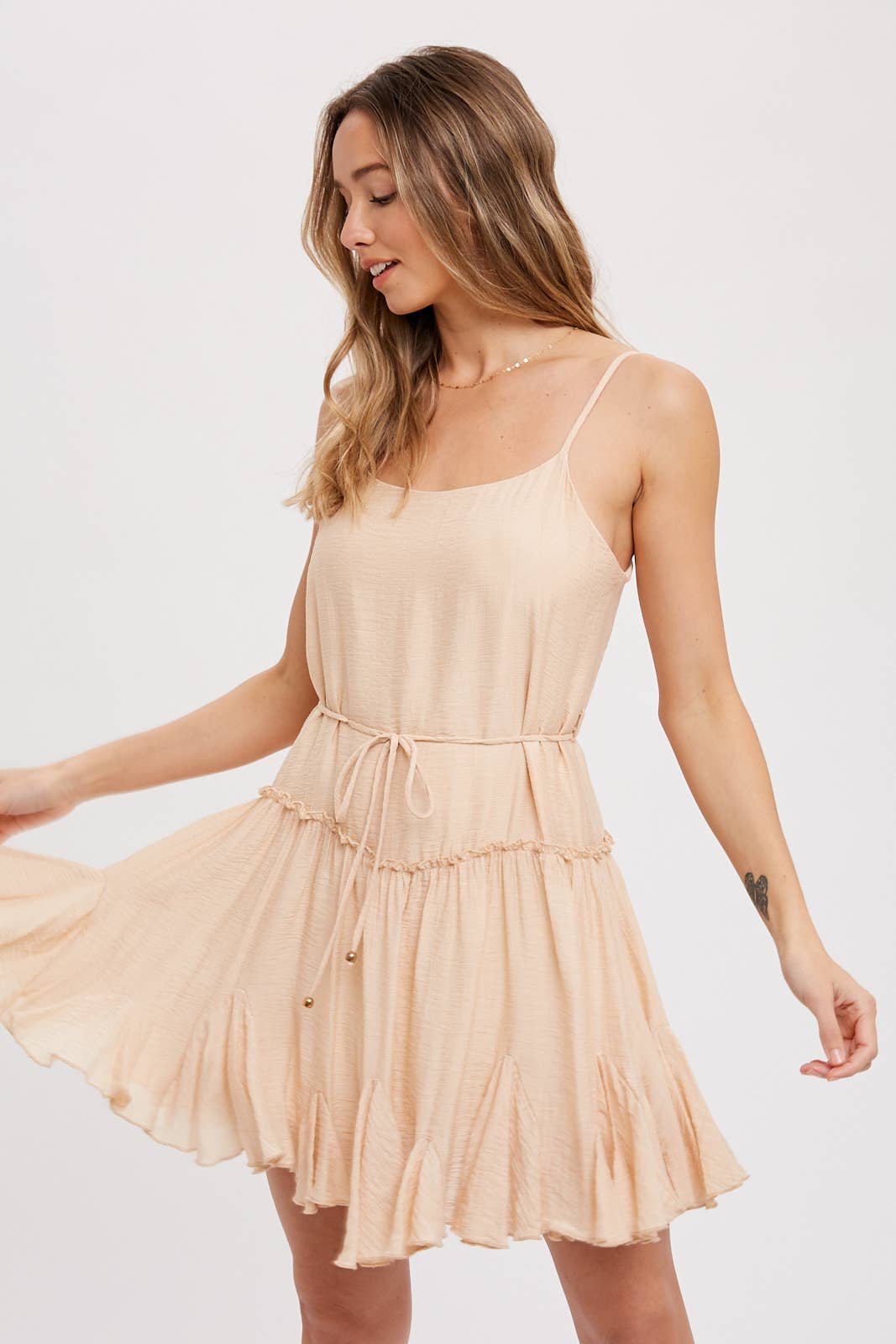 Lightweight cami swing dress with scoop neck, adjustable straps, ruffled hem &amp; tie waist. A flirty, flowy summer must-have in 3 dreamy color options.