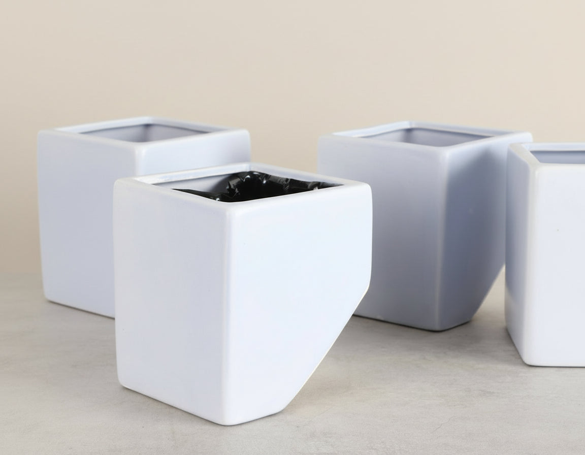 Sky Blue ceramic wall planter for succulents, air plants, and 3" pots. Modern wall-mounted design adds bright, space-saving style to any indoor plant display.