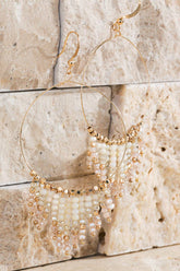 Shimmering beaded tassel chandelier earrings with a lightweight metal ring, hypoallergenic fish hooks, and dazzling glass beads—perfect for any occasion! 