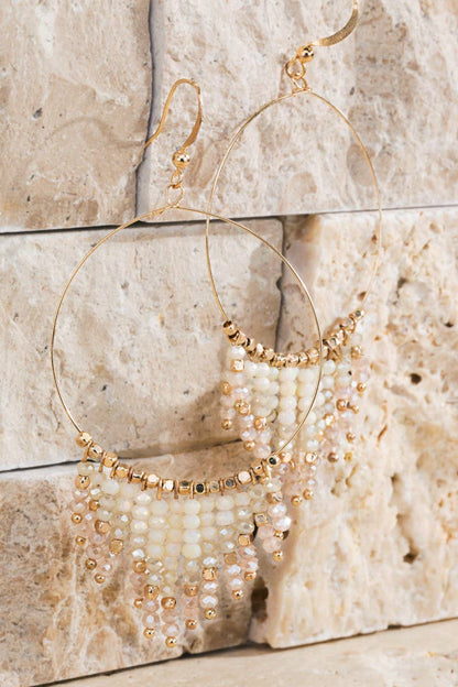Shimmering beaded tassel chandelier earrings with a lightweight metal ring, hypoallergenic fish hooks, and dazzling glass beads—perfect for any occasion! 
