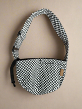 Pet Crossbody Sling and Carrier keeps you hands free while your pet stays secure. Adjustable strap, cozy design and safety clip for everyday adventures.