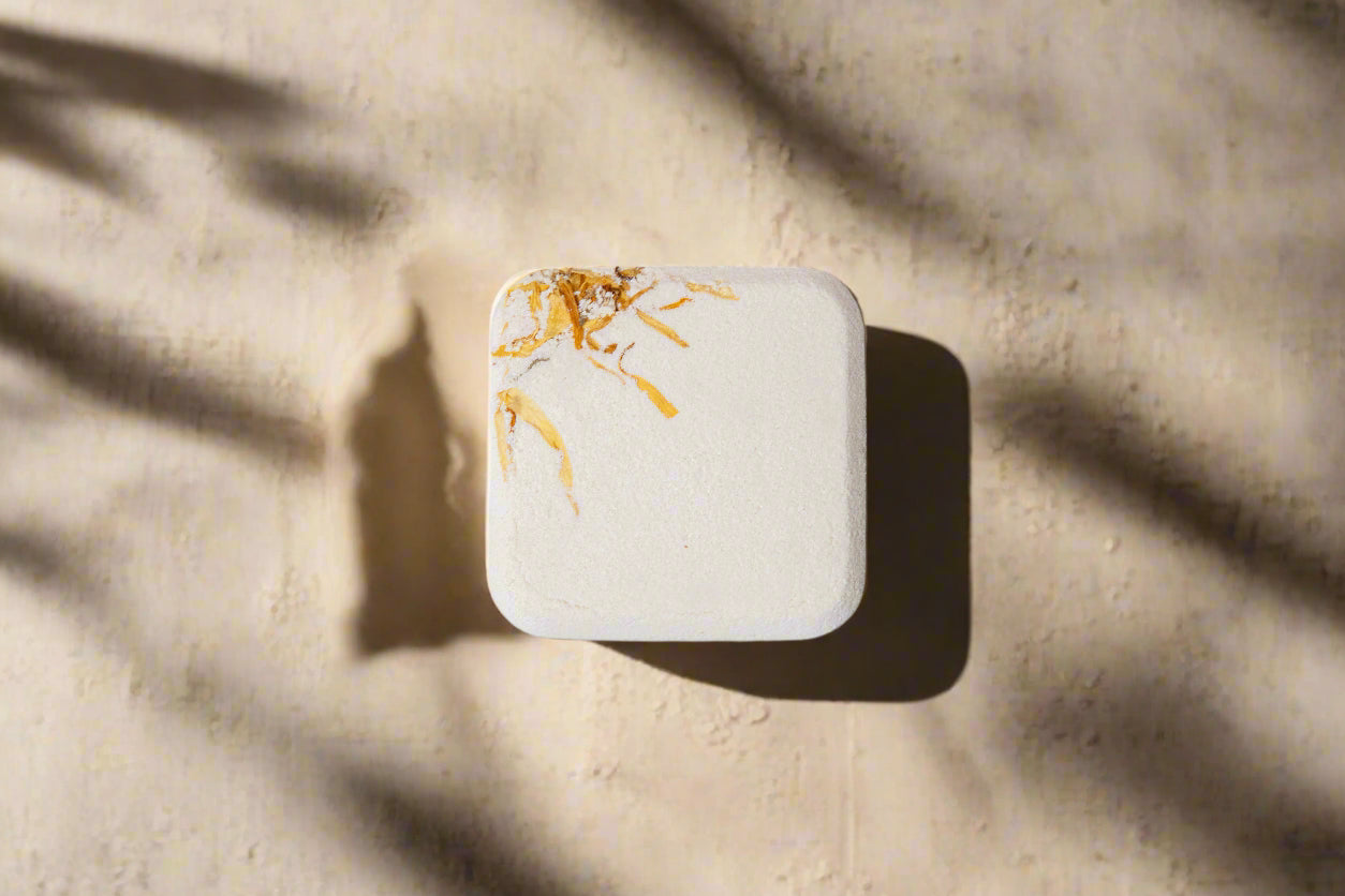 2oz handmade botanical bath bomb. Biodegradable wrap, rich oils, fizzy soak. Skin-softening, aromatic, and perfect for gifting or daily self-care rituals.