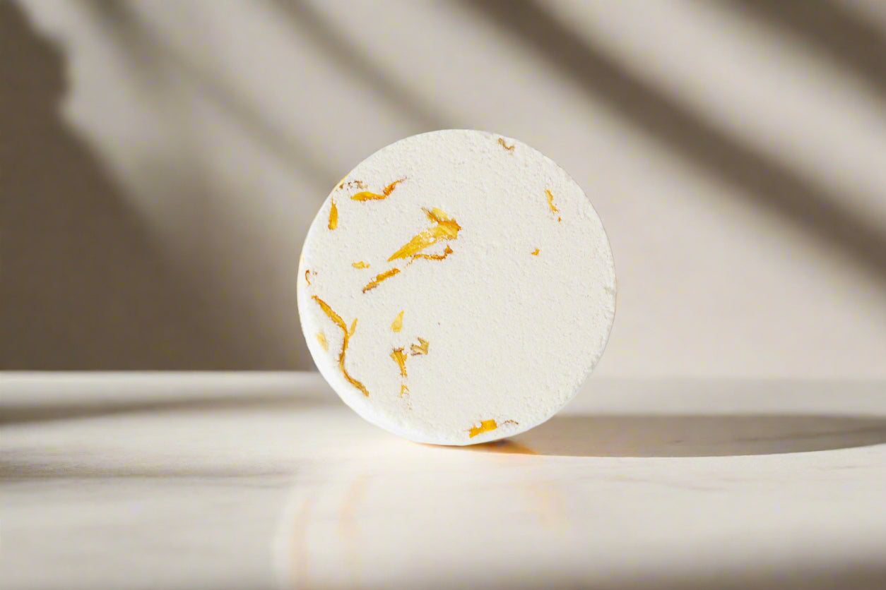 Aromatherapy shower steamer with essential oils. Biodegradable, handmade, and ultra-scented for a spa-like experience. Not for use as a bath bomb.