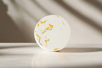 Aromatherapy shower steamer with essential oils. Biodegradable, handmade, and ultra-scented for a spa-like experience. Not for use as a bath bomb.