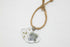 Pressed flower resin suncatcher ornaments with real botanicals in heart, butterfly, and organic shapes—handmade, one-of-a-kind nature keepsakes by Angel Singh.