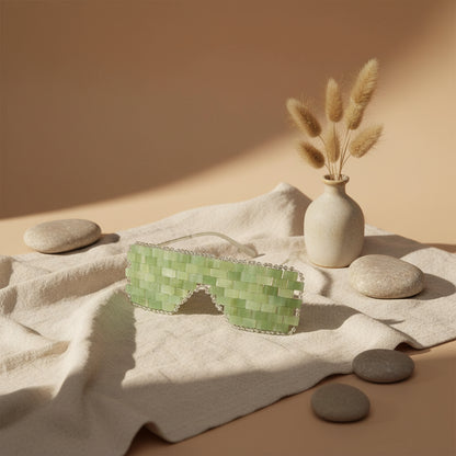 Cooling or warming jade eye mask made from 100% real jade beads. Reduces puffiness, soothes tension, boosts circulation, and brings calm, balance, and radiant renewal.