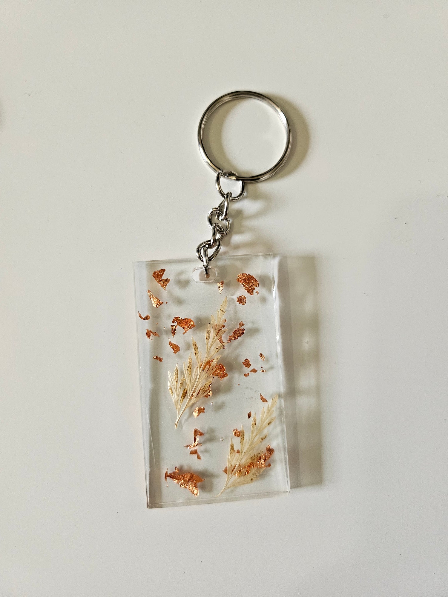 These Resin Pressed Flowers Keychains are handcrafted with real dried flowers suspended in crystal-clear resin. 