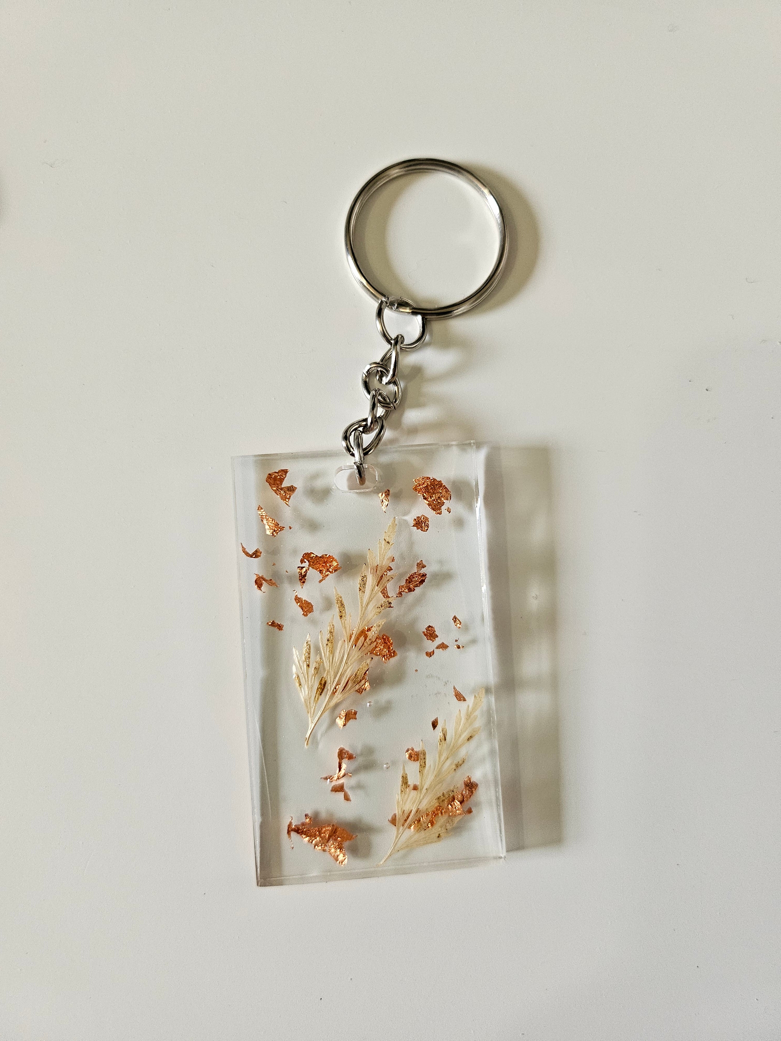These Resin Pressed Flowers Keychains are handcrafted with real dried flowers suspended in crystal-clear resin. 
