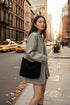 Corduroy Tote Bag with adjustable guitar strap, zipper closure and roomy design. A soft, stylish everyday shoulder bag for work, travel or nights out.