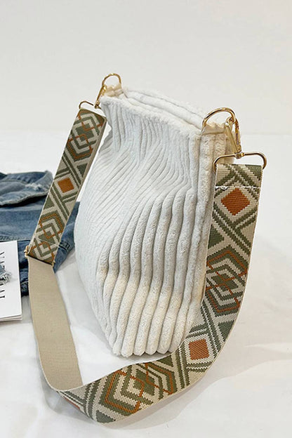 Corduroy Tote Bag with adjustable guitar strap, zipper closure and roomy design. A soft, stylish everyday shoulder bag for work, travel or nights out.