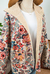 Stay cozy in this Vintage Paisley Floral Sherpa Lined Hooded Jacket—retro print, warm lining, and a comfy hood for stylish cold-weather layering.