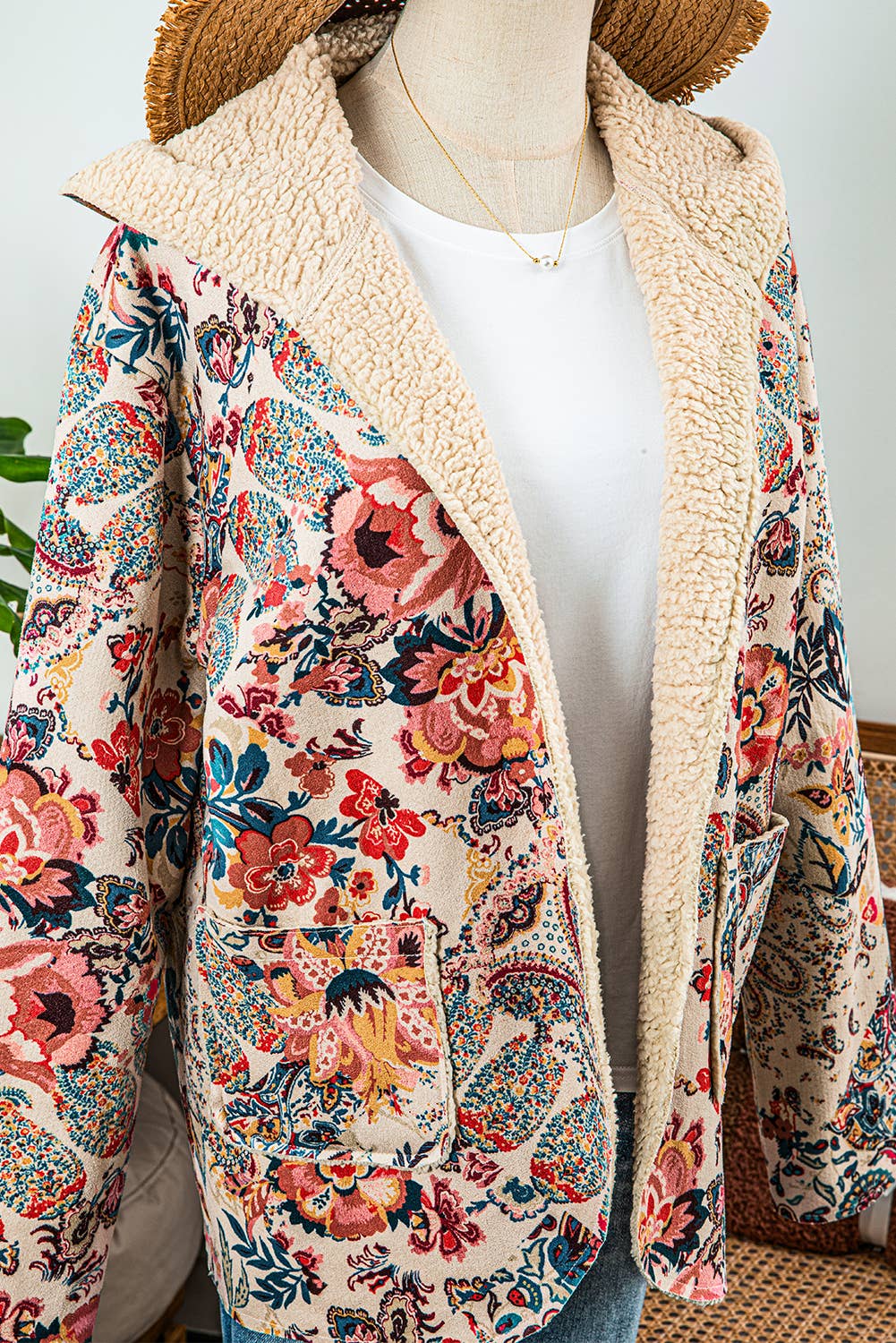 Stay cozy in this Vintage Paisley Floral Sherpa Lined Hooded Jacket—retro print, warm lining, and a comfy hood for stylish cold-weather layering.